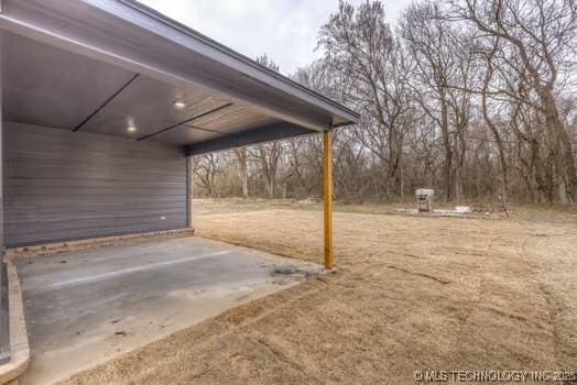 view of yard featuring a carport