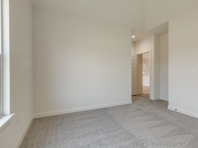 view of carpeted spare room