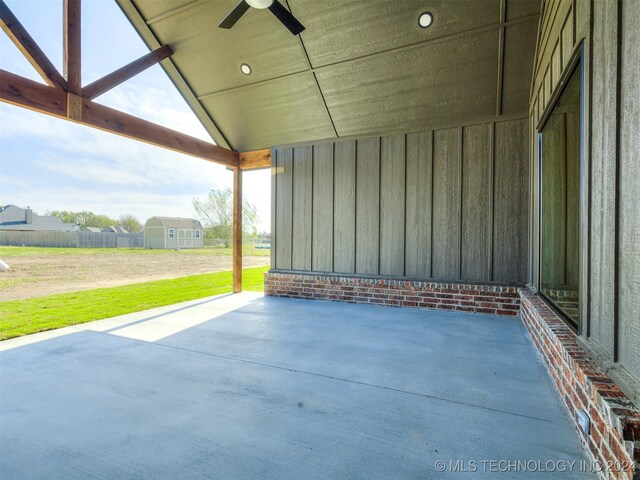 view of patio featuring ceiling fan