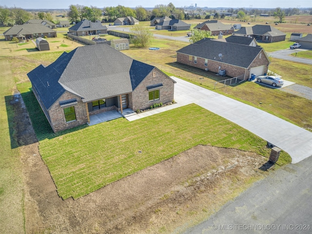 drone / aerial view with a residential view