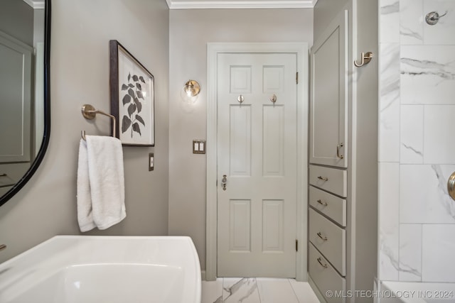 bathroom with ornamental molding