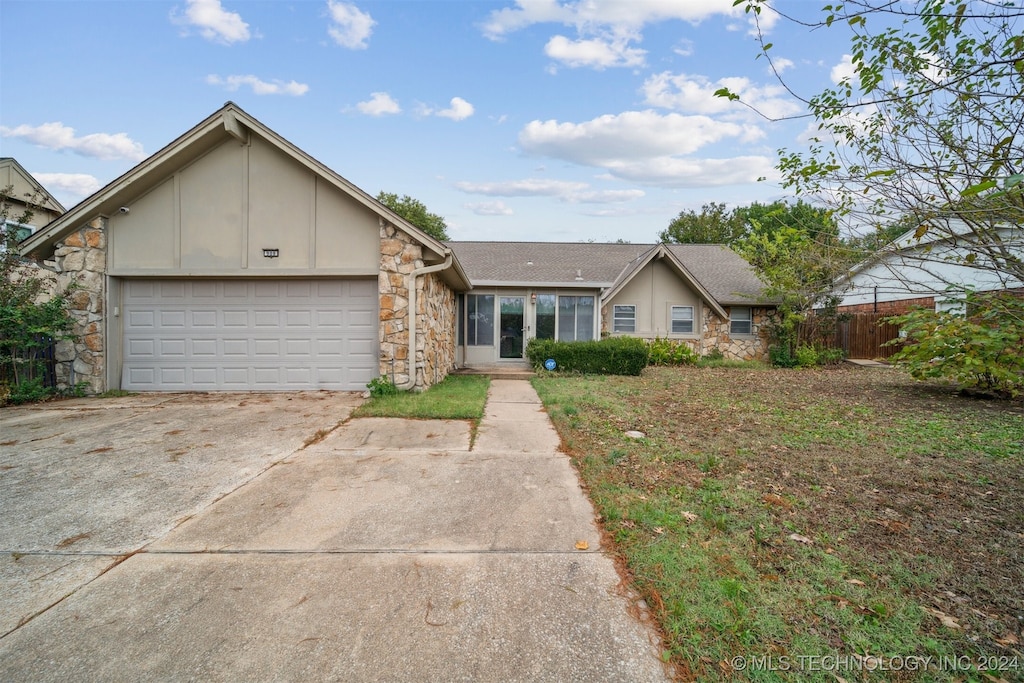 ranch-style house with a garage