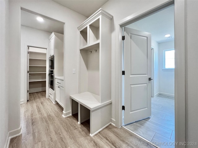 mudroom featuring light hardwood / wood-style floors