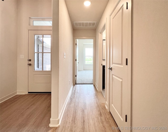 hall featuring light wood-type flooring