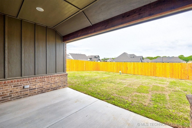 view of yard featuring a fenced backyard and a patio area