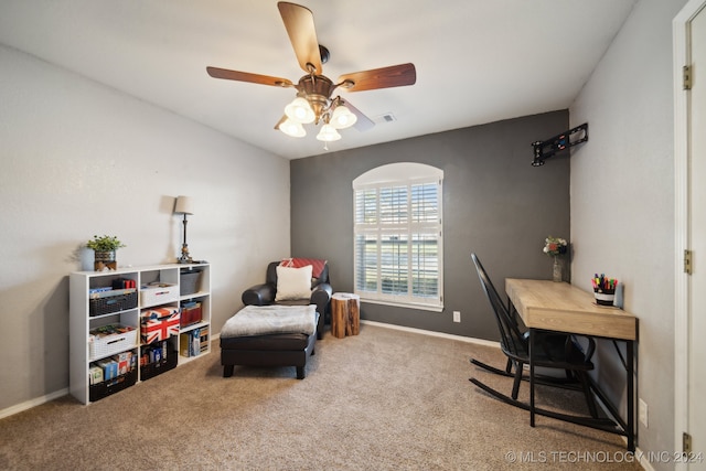 interior space with a closet, carpet, and ceiling fan