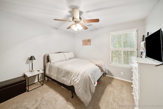 bedroom featuring ceiling fan and carpet flooring