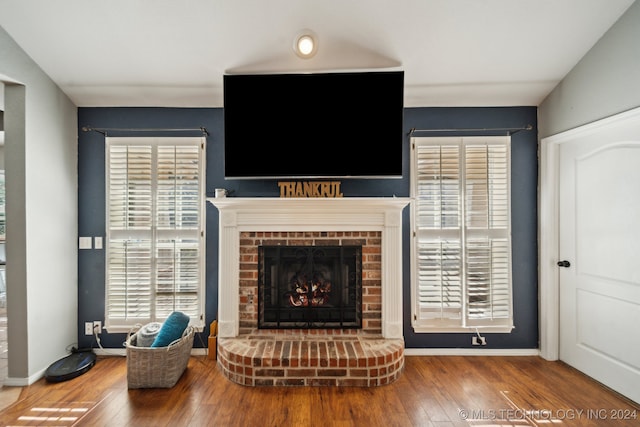 living room with high vaulted ceiling, ceiling fan, sink, and light hardwood / wood-style floors