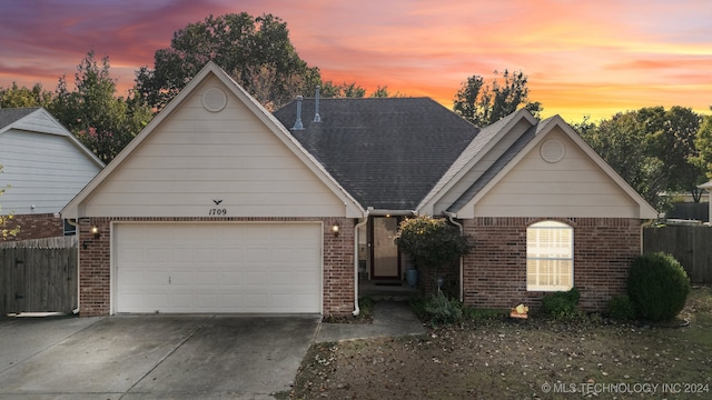 view of front of home with a garage