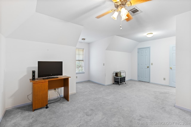 office with ceiling fan, vaulted ceiling, and light colored carpet