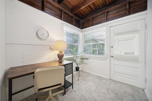 home office featuring brick wall, beam ceiling, and wood ceiling