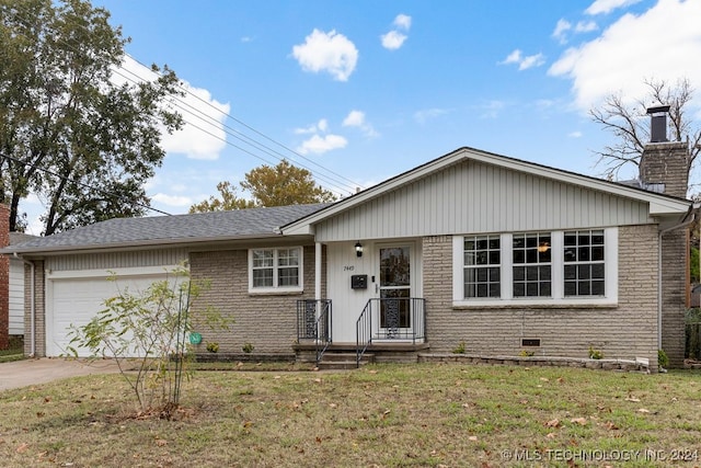 ranch-style house with a garage and a front yard