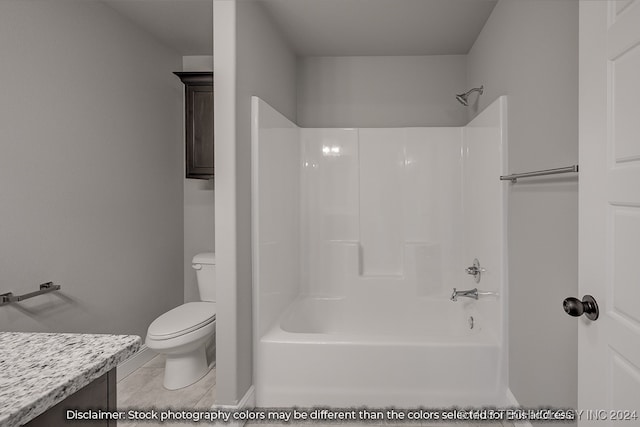 full bathroom featuring toilet, shower / tub combination, vanity, and tile patterned floors