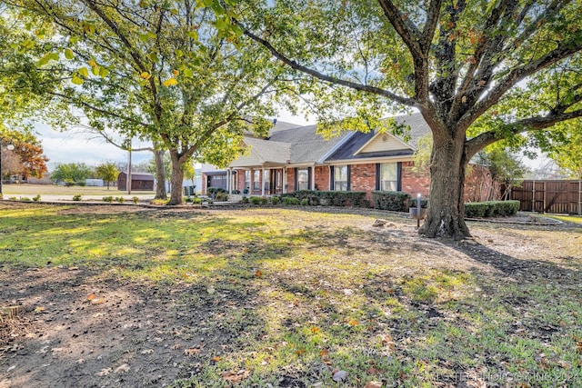 ranch-style house with a front yard