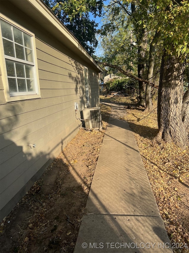 view of home's exterior featuring central AC