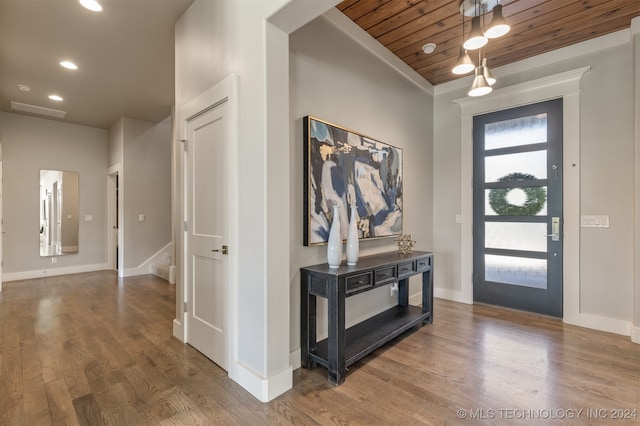 entryway featuring hardwood / wood-style floors and wood ceiling