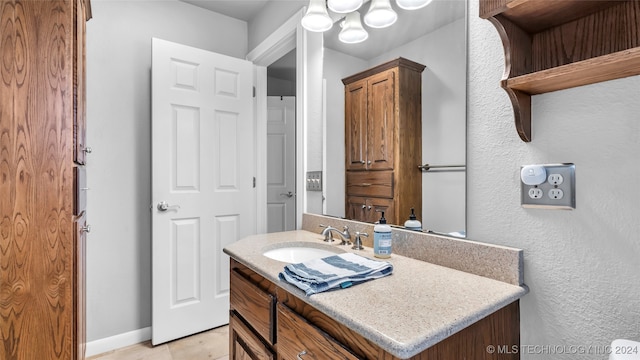 bathroom featuring tile patterned floors and vanity