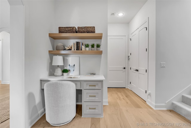 home office featuring light hardwood / wood-style flooring