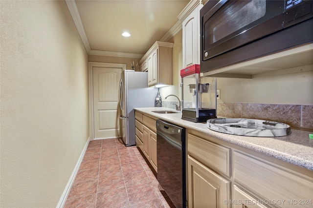 kitchen with light tile patterned flooring, crown molding, black dishwasher, light brown cabinets, and sink