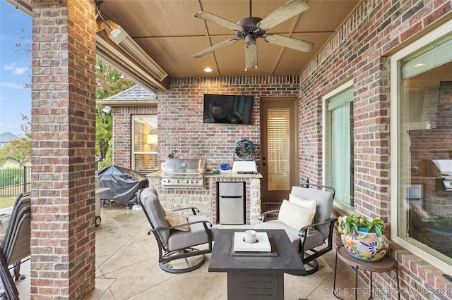 view of patio / terrace featuring an outdoor kitchen, ceiling fan, outdoor lounge area, and grilling area