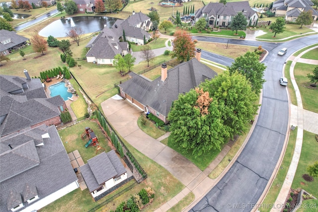 bird's eye view with a water view