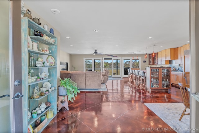 living room with ceiling fan