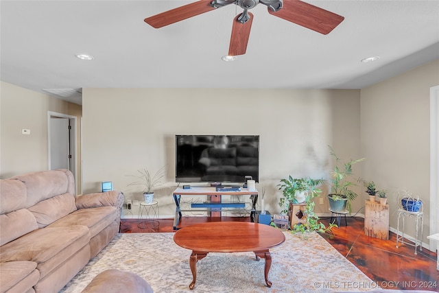 living room with hardwood / wood-style floors and ceiling fan