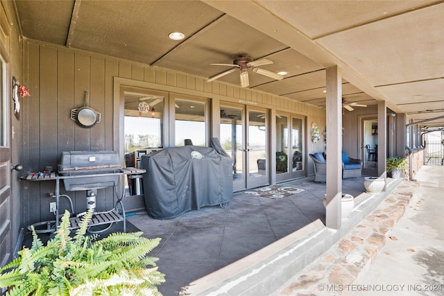 view of patio / terrace featuring french doors, ceiling fan, and a grill