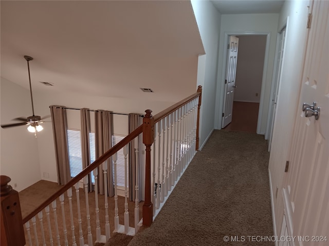 hallway with carpet