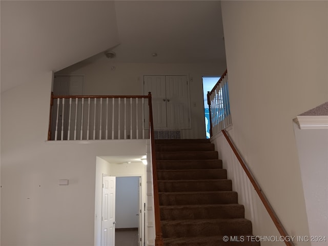 stairway with a high ceiling