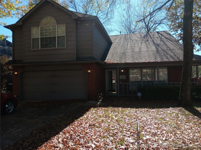 front of property with a garage