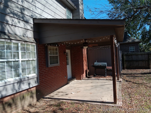 view of patio featuring ceiling fan and grilling area