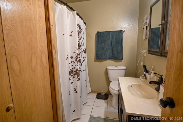 bathroom with tile patterned flooring, vanity, toilet, and a shower with shower curtain