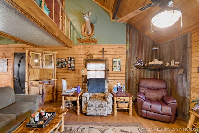 living room with wood ceiling, wooden walls, lofted ceiling with beams, and wood-type flooring