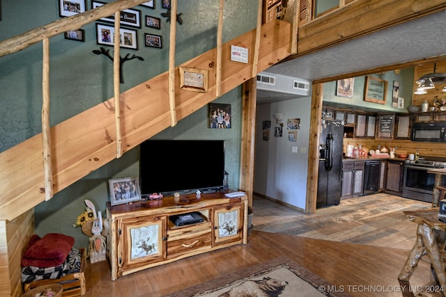 living room featuring dark hardwood / wood-style floors