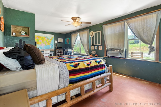 bedroom featuring ceiling fan, concrete floors, and cooling unit