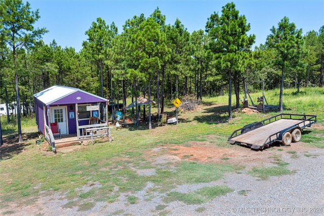 view of yard featuring a porch