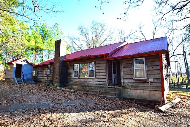 view of front of property featuring cooling unit