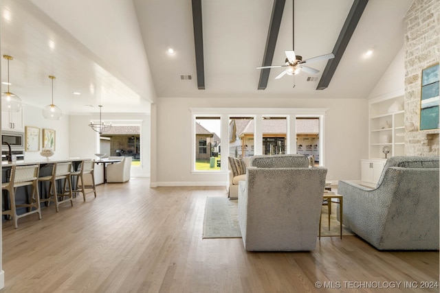 living room featuring ceiling fan, beamed ceiling, light hardwood / wood-style flooring, and high vaulted ceiling