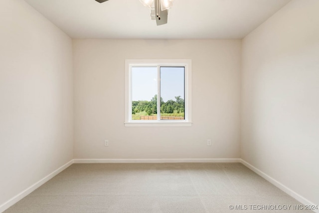 empty room featuring carpet flooring