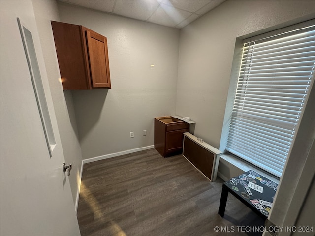 washroom with dark wood-type flooring