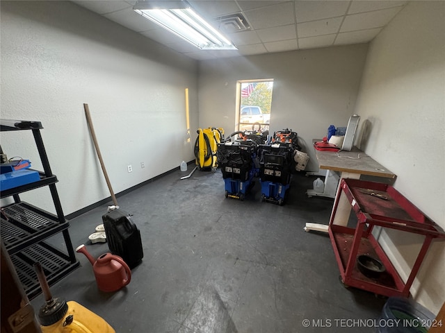 miscellaneous room featuring a drop ceiling