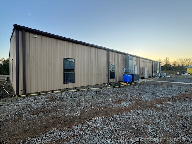 view of property exterior at dusk