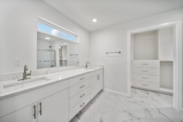 bathroom featuring vanity and walk in shower