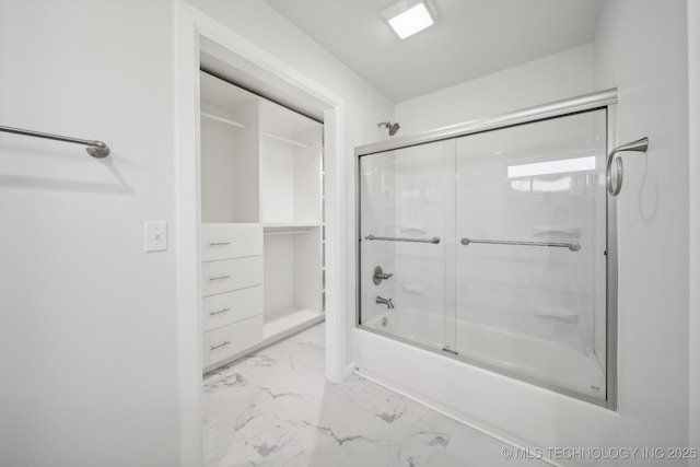 bathroom featuring enclosed tub / shower combo