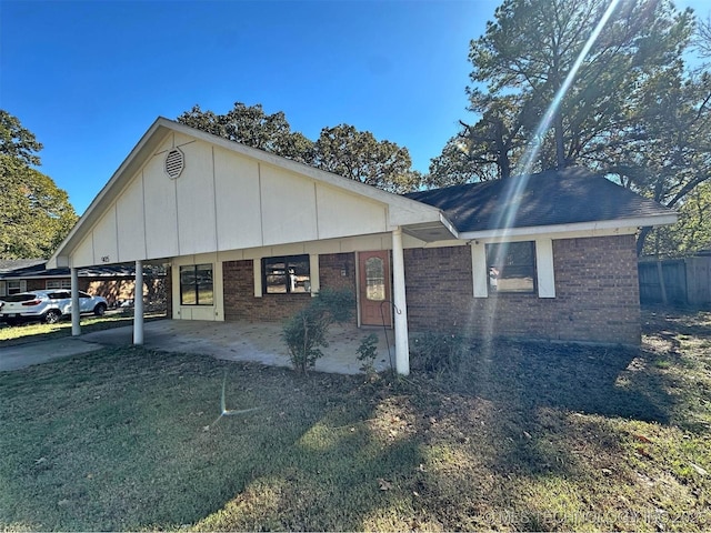 exterior space with a carport