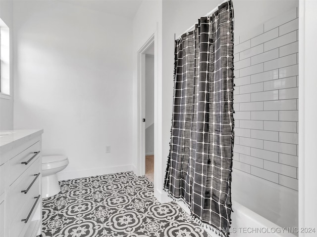 full bathroom featuring shower / bathtub combination with curtain, tile patterned flooring, vanity, and toilet