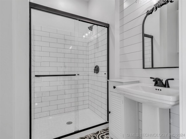 bathroom featuring sink and walk in shower