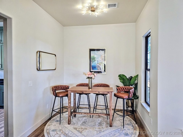 dining room featuring wood-type flooring