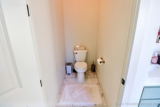 bathroom featuring toilet